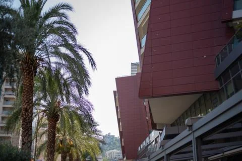 Modern building facade with distinctive reddish-brown panels Stock Photos