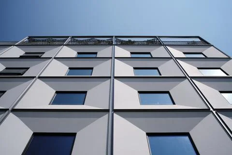 Modern building facade featuring geometric pattern and windows 写真素材