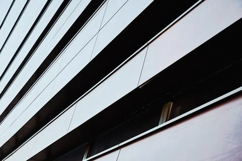 Modern building facade with geometric pattern Stock Photos