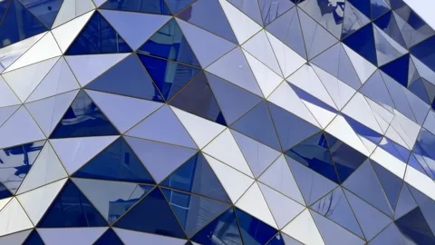 Modern building facade with geometric triangular pattern. Stock Footage 308169424