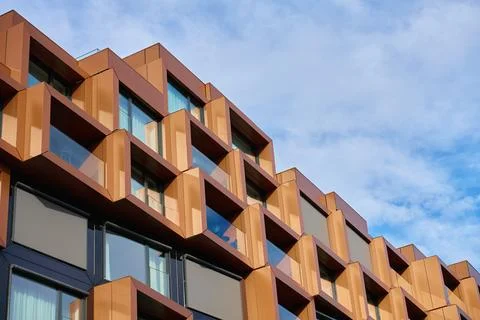 Modern building facade with geometric window frames Stock Photos
