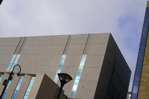 Modern Building Facade With Geometric Windows And Street Light In Leeds, Stock Photos