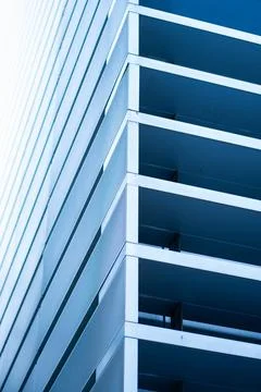 Modern building facade showcasing geometric lines, abstract patterns Stock Photos