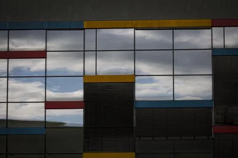 Modern building facade with sky reflections Stock Photos