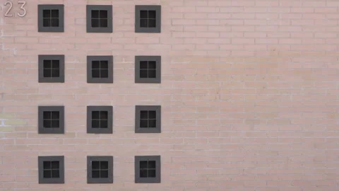 Modern building facade with symmetrical windows pattern Stock Footage 329934926