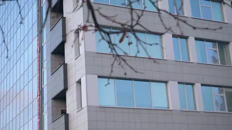 A modern building facade taken from a corner Stock Footage 301545692