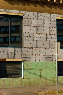 Modern building facade under renovation close up Stock Photos