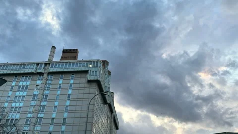 Modern Building Facade Under Stormy Sky Stock Footage 274851645