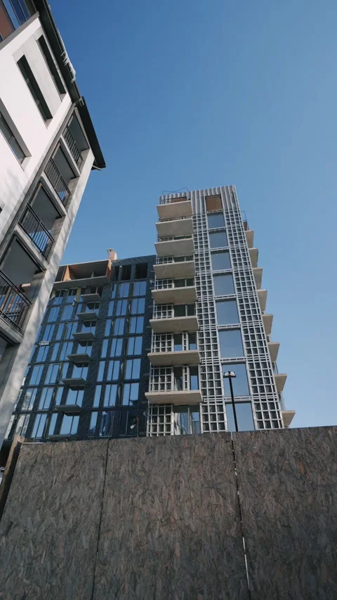 Modern building with glass facade (low angle) Stock Footage 327842787