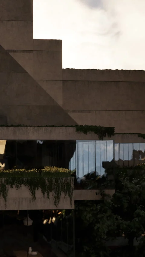 Modern building with green elements and sun reflection in the afternoon Stock Footage 339411246