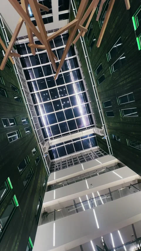 Modern building lobby featuring a high ceiling and open atrium design, vertic Video stock 328189851