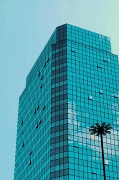 Modern Building with Mirrored Clouds Stock Photos