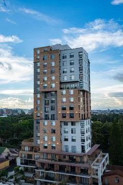 Modern building with mixed materials such as brick wood and steel during th.. Stock-Fotos