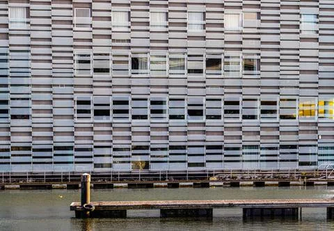 Modern building with repeating window pattern Stock Photos