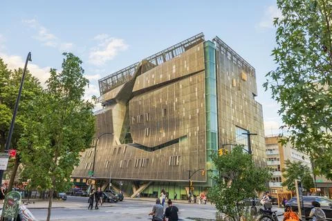 Modern building with unique architectural design glass elements and people Foto stock