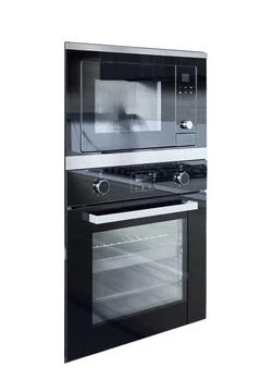 Modern built-in kitchen appliance set isolated on white black glass microwa.. Stock Photos