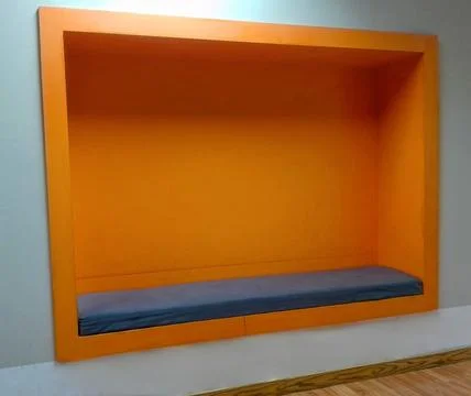 Modern Built-In Waiting Bench with Warm Orange Lighting Stock Photos