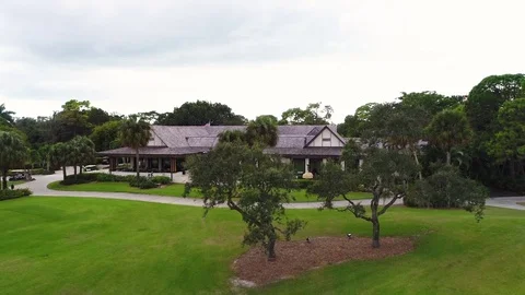 Modern bungalow surrounded with trees Video stock 83819253