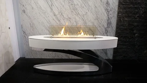 Modern burning interior fireplace with marble stone background. Video stock 114561155