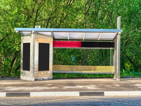 Modern bus stop with blank black banner. Stock Photos