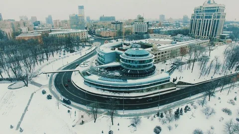 Modern business center against cityscape at winter morning.Aerial drone view Stock Footage