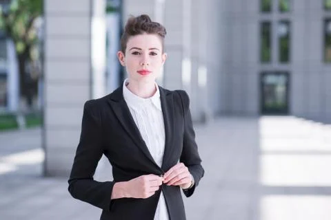 Modern business woman showing confident Stock Photos