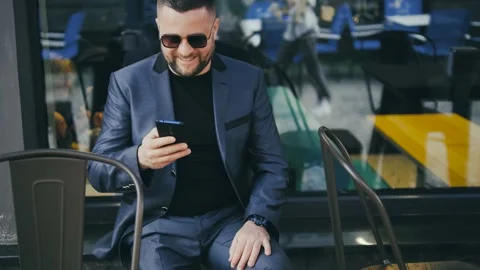 Modern businessman checking time on watch at street. Stock Footage 172503171