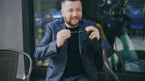 Modern businessman checking time on watch at street. Stock Footage 172503174