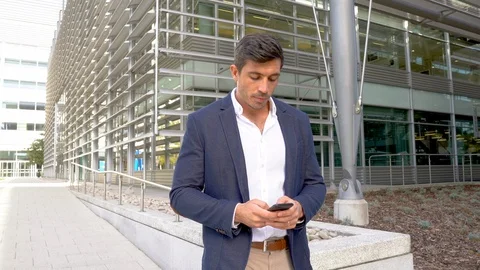 Modern businessman using phone texting 4K Stock Footage 96048907