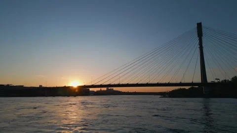 Modern cable bridge over Vistula river at sunset, contemporary structures of Stock Footage 274741372