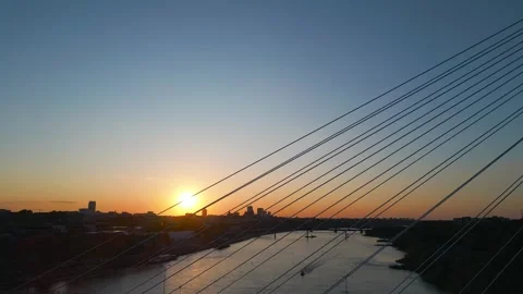 Modern cable bridge over Vistula river at sunset, contemporary structures of Stock Footage 274741977