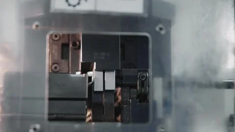 Modern cable production connector crimp assembly machine in operation in indu Stockbeeldmateriaal 331248049