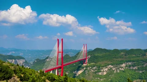 Modern cable-stayed bridge across the Grand Canyon Stock Footage 156432096