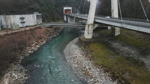 Modern cable-stayed bridge across the Mzumta River in a mountainous area. Sochi. Stock Footage 169763171