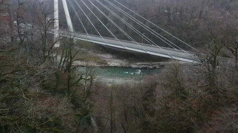 Modern cable-stayed bridge across the Mzumta River in a mountainous area. Sochi. Stock Footage 170164451