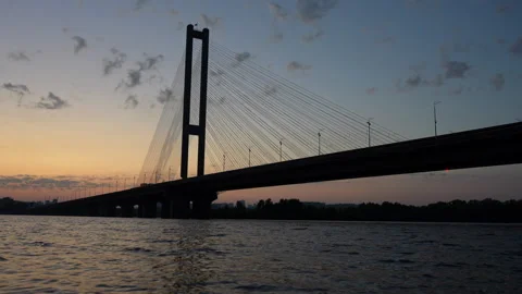 Modern Cable-Stayed Bridge over Water at Sunset Stock Footage 287597018