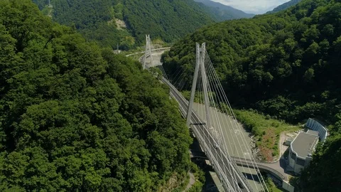 Modern cable-stayed road bridge Sochi Russia suburban cars traffic From above    Stock Footage 122632082