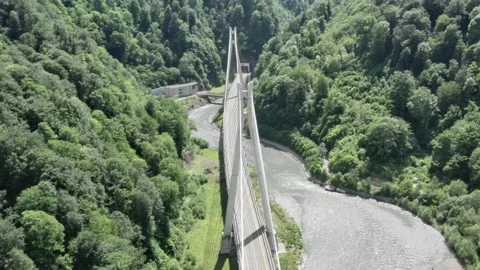 Modern cable-stayed road bridge Sochi Russia. cars traffic among high mountains Vidéo 144490360