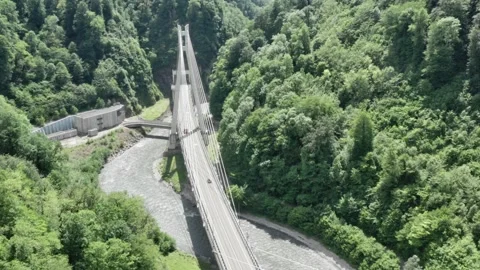 Modern cable-stayed road bridge Sochi Russia. cars traffic among high mountains Vidéo 144490431
