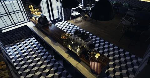Modern cafe interior with unique flooring and coffee bar setup at daytime Stock Illustration