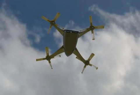 Modern camera drone in flight, bottom view of the futuristic black concept cloud Stock Illustration