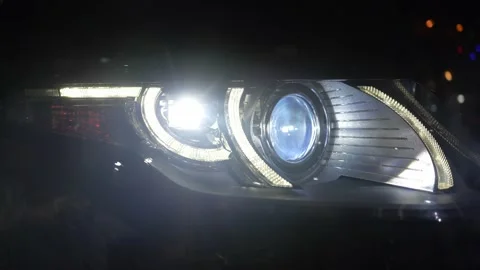 Modern car adaptive LED Matrix headlight headlamp with side marker indicator Stock Footage 229485349