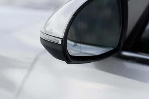 Modern car BCW system. Blind Spot Warning indicator on the car rearview mirro Stock Photos