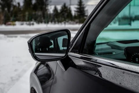 Modern car BCW system. Blind Spot Warning indicator on the car rearview mirro Stock Photos