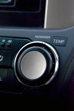 Modern car climate control panel for driver and passenger. Car interior detail Stock Photos