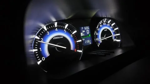 The modern car dashboard display features indicators for speed and fuel levels Stock Footage 297936729