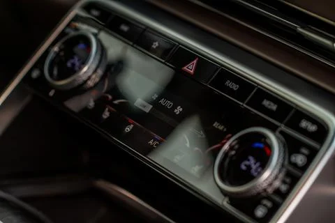 Modern car digital automatic climate control system. Car air conditioning sys Stock Photos