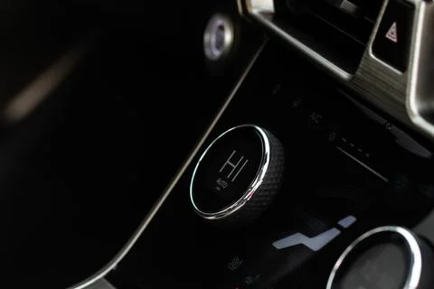 Modern car. Drivers temperature control. Car air conditioning system button.  Foto stock