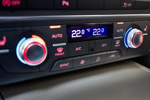 Modern car four zone automatic climate control panel for driver and passengers Stock Photos