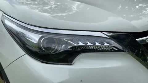 Modern car headlight close up Video stock 162907642